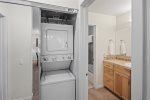 Stackable washer dryer in hall